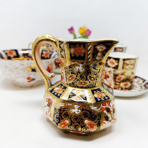 815 - A set of six Royal Crown Derby Coffee cans, and saucers, a pocket barometer, and assorted ceramics (... 