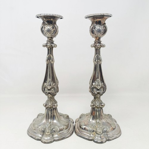 818 - An early 20th century wall ceiling oil lamp, with an opaque glass shade, and a pair of silver plated... 