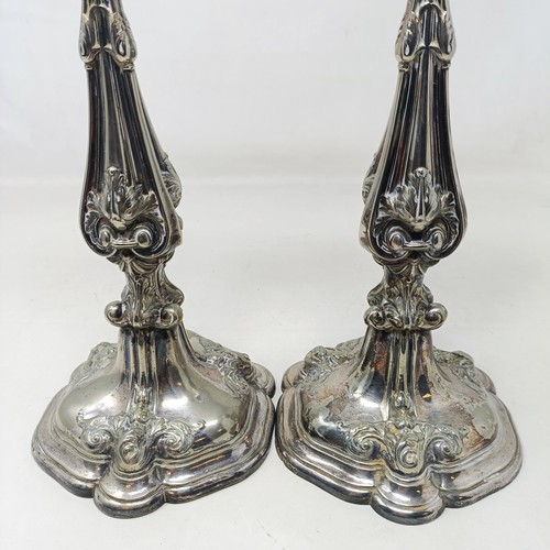 818 - An early 20th century wall ceiling oil lamp, with an opaque glass shade, and a pair of silver plated... 