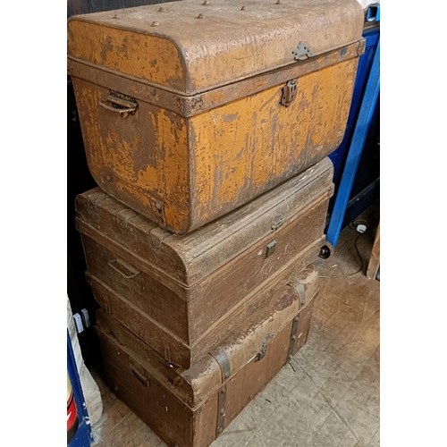 828 - Three tin trunks, 74 cm wide