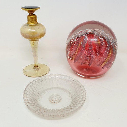 10A - A Lalique pin dish, the base inscribed R Lalique France, 10 cm diameter, a paperweight, and a scent ... 