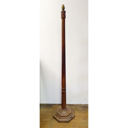 33 - A Robert 'Mouseman' Thompson of Kilburn oak standard lamp, 140 cm high