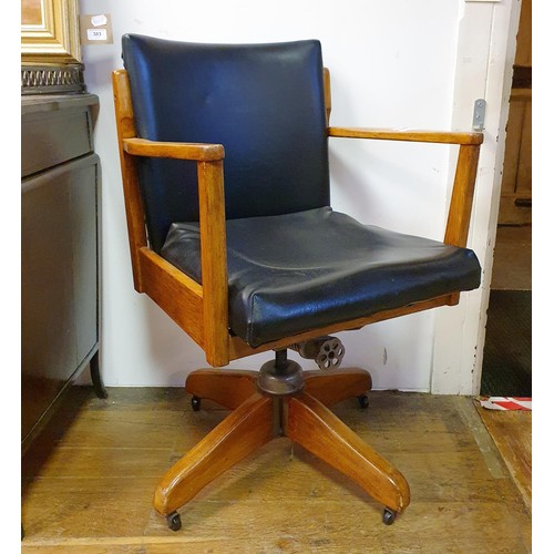 35 - A teak framed office chair