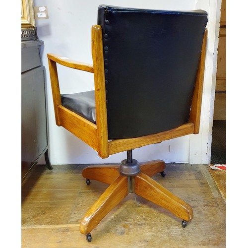 35 - A teak framed office chair