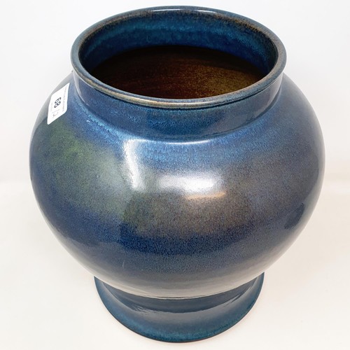 68 - A 20th century blue glazed vase, 32 cm high, and a Studio pottery bowl, 8 cm high (2)