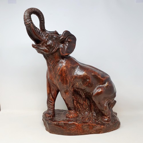 100A - A terracotta figure, of an elephant, by Thomas Francois Cartier (French 1879-1943), signed, 44 cm hi... 