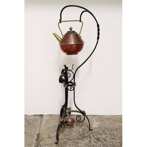 142 - A Dr Christopher Dresser style copper kettle, on a wrought iron stand,  85 cm high