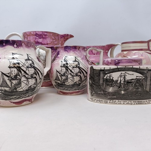 839 - A 19th century Sunderland lustre jug, decorated a galleon and a motto, 19 cm high, five other jugs, ... 