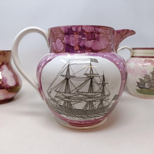 839 - A 19th century Sunderland lustre jug, decorated a galleon and a motto, 19 cm high, five other jugs, ... 