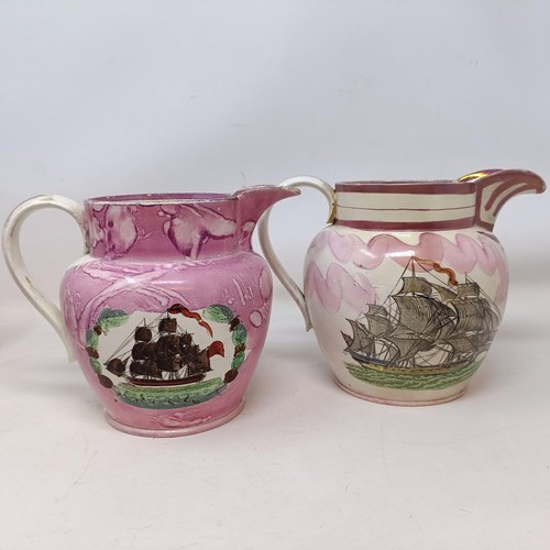 839 - A 19th century Sunderland lustre jug, decorated a galleon and a motto, 19 cm high, five other jugs, ... 