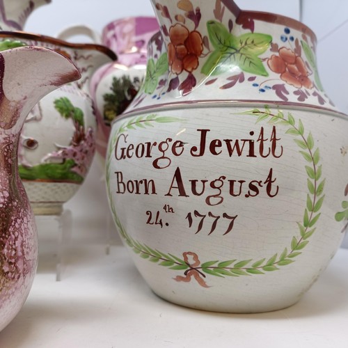 838 - A 18th century Sunderland lustre jug, with a motto reading George Jewitt Born August 24th 1777, 19 c... 