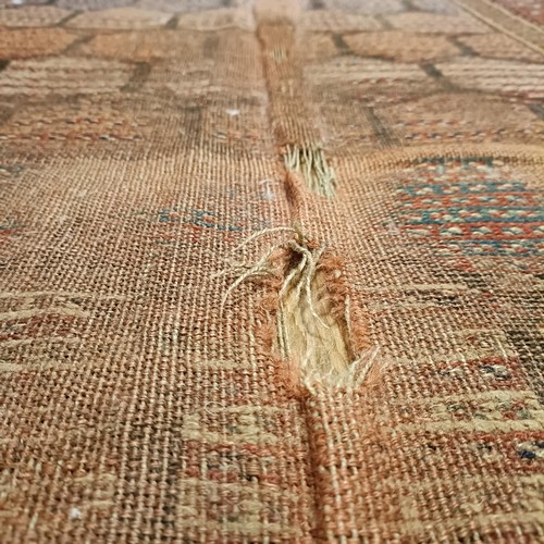 984 - A Persian red ground runner, 253 x 196 cm