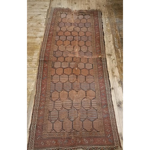 984 - A Persian red ground runner, 253 x 196 cm