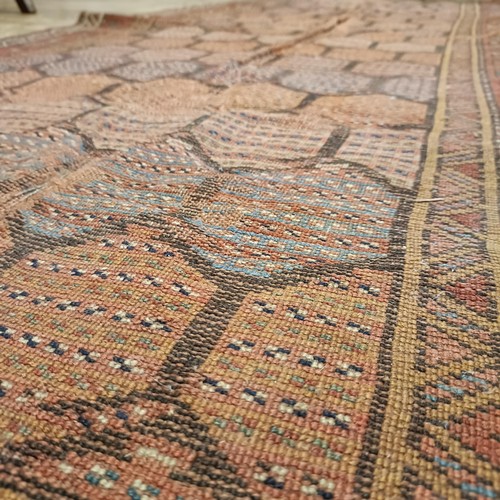 984 - A Persian red ground runner, 253 x 196 cm