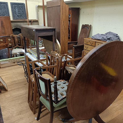 977 - An oak drop leaf table, 99 cm wide, an oval mirror, a set of four oak dining chairs, and other items... 