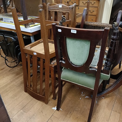 977 - An oak drop leaf table, 99 cm wide, an oval mirror, a set of four oak dining chairs, and other items... 