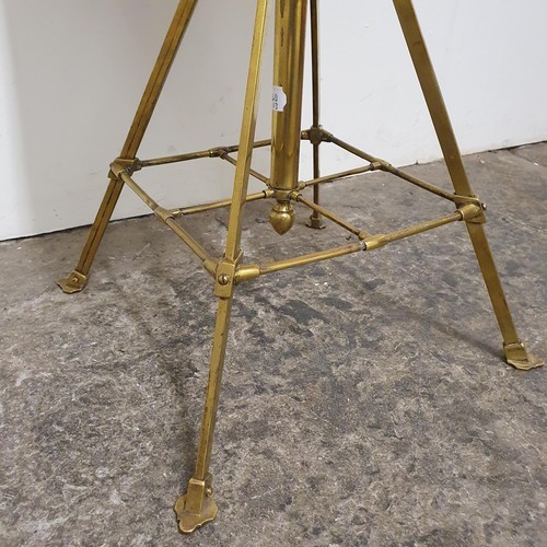 133 - A Victorian Aesthetic movement brass harp stool