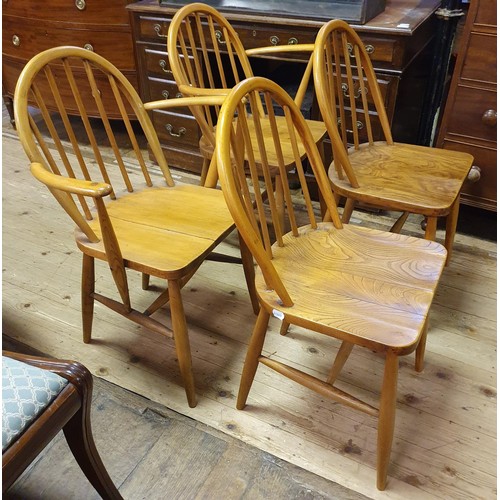 144 - A set of four Ercol elm hoop back dining chairs (2+2)