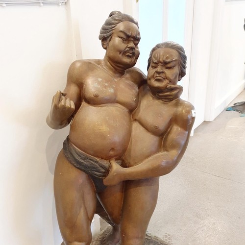 132 - An unusual bronze group, of two Sumo wrestlers, 100 cm high