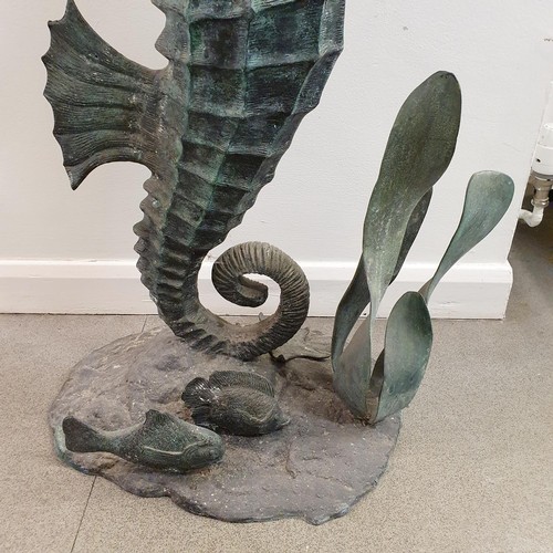 134 - A bronze figure, of a seahorse, 87 cm high