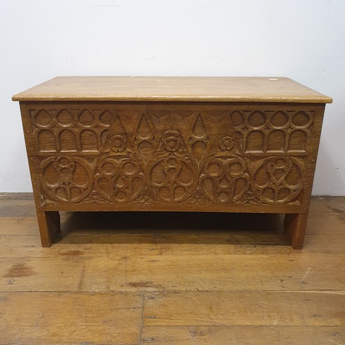 29A - A Heals style carved oak coffer, 82 cm wide,