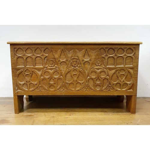 29A - A Heals style carved oak coffer, 82 cm wide,