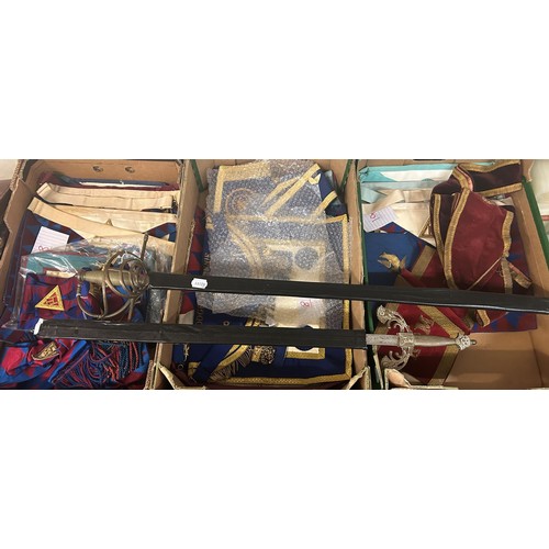 653 - A large quantity of Masonic aprons, sashes and cuffs, and two swords (3 boxes)