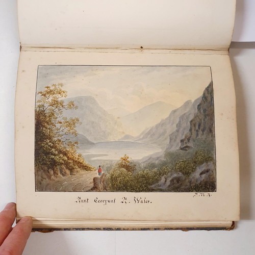 426 - An early 19th century scrapbook, with various watercolour, pencil drawing and other illustrations