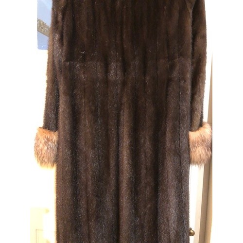 618 - A lady's Harrods full length fur coat, with matching collar and cuffs and a Grosvenor, Canada, Exclu... 