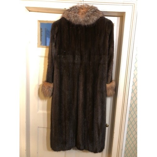 618 - A lady's Harrods full length fur coat, with matching collar and cuffs and a Grosvenor, Canada, Exclu... 