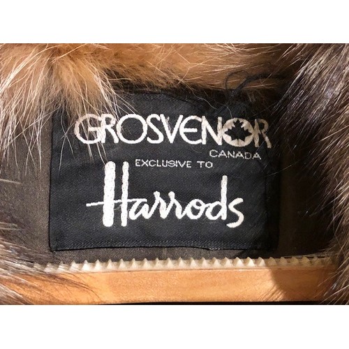 618 - A lady's Harrods full length fur coat, with matching collar and cuffs and a Grosvenor, Canada, Exclu... 