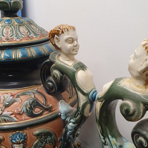 131A - A pair of Swedish, Rorstrand majolica covered vases, 64 cm high