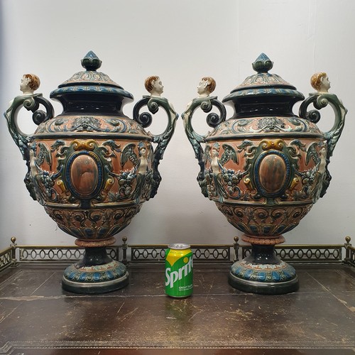 131A - A pair of Swedish, Rorstrand majolica covered vases, 64 cm high