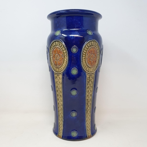 545 - A Royal Doulton vase, decorated oval panels, 32 cm high