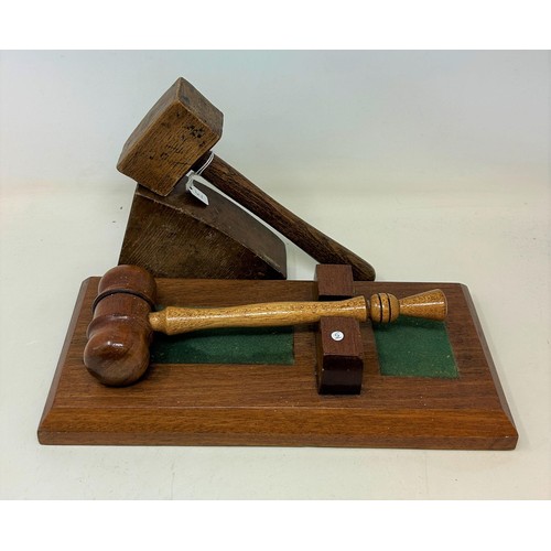 536 - A Masonic gavel and base, and another gavel and base