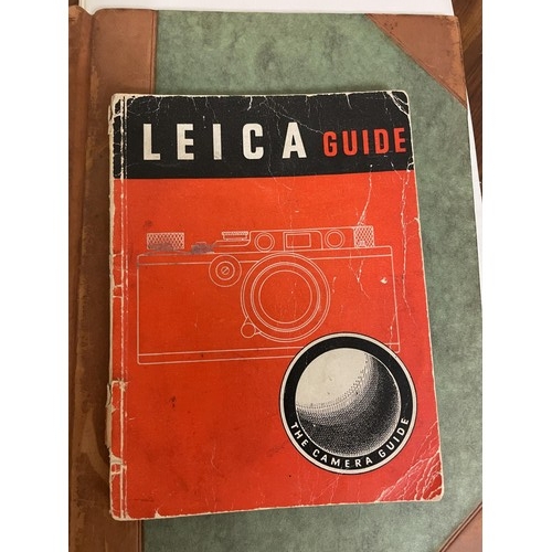 535 - A Leica camera guide book, and a quantity of keys