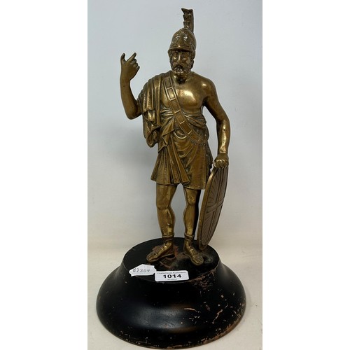 522 - A brass figure of a Roman centurion, 30 cm high, on a later ebonised base