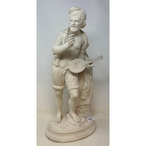 503 - A parianware figure, of a musician, 46 cm high