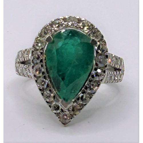 4 - An 18ct white gold, emerald and diamond ring, ring size H...