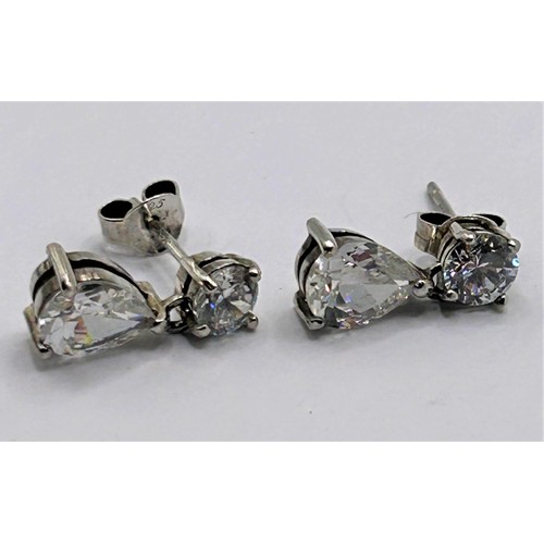5 - A pair of diamond drop earrings, with round and pear shaped stones...