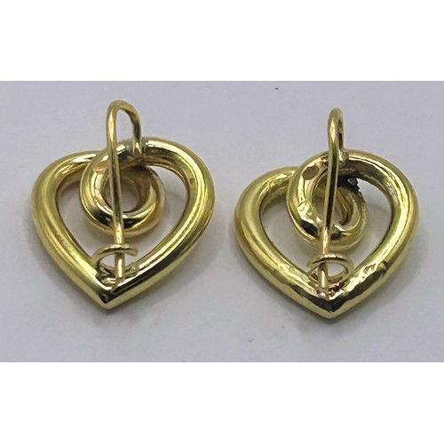 23 - A pair of 18ct gold heart shaped earrings, 3.6 g...