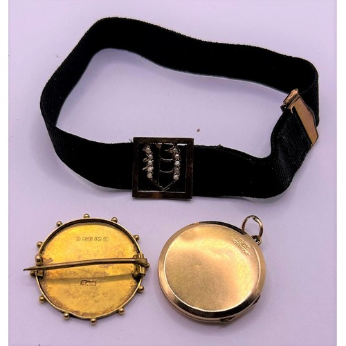 34 - A 9ct gold and sapphire locket, a 9ct gold brooch, a silk bracelet, with a yellow metal and seed pea...