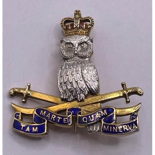 46 - A 9ct white and yellow gold, blue enamel military sweetheart brooch, for the Defence Services Staff ...