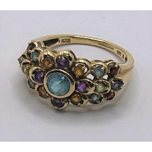 65 - A 9ct and multicoloured stone ring, ring size K1/2