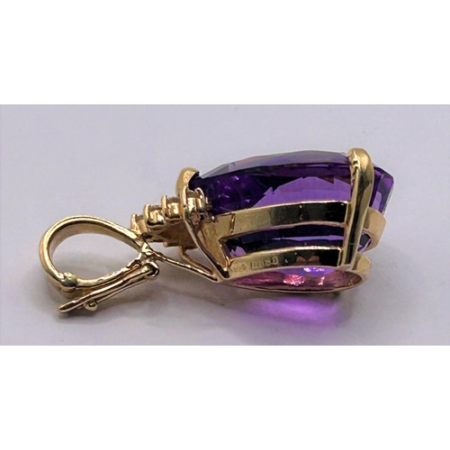 72 - A yellow metal, amethyst and diamond pendant