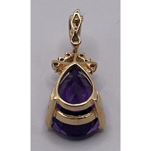 72 - A yellow metal, amethyst and diamond pendant