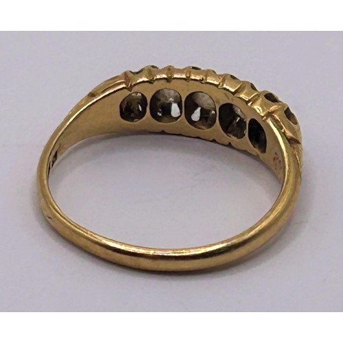 76 - An 18ct gold and five stone diamond ring, ring size N