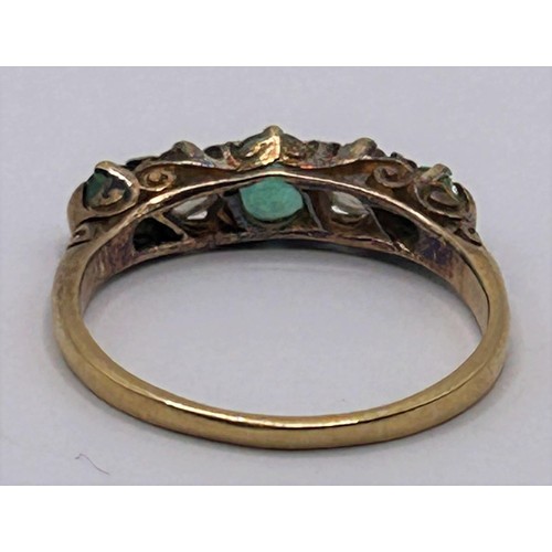 77 - A yellow metal, diamond and emerald five stone ring, ring size N