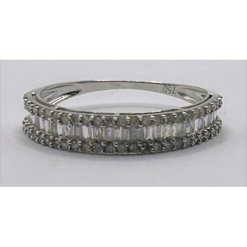 90 - An 18ct white gold and diamond half eternity ring, ring size L