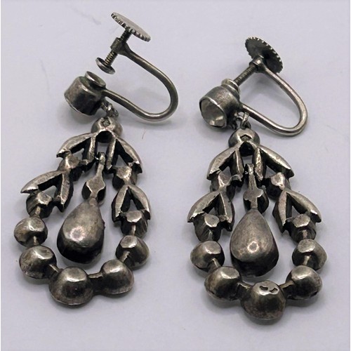 103 - A pair of late 19th/early 20th century silver and paste set drop earrings